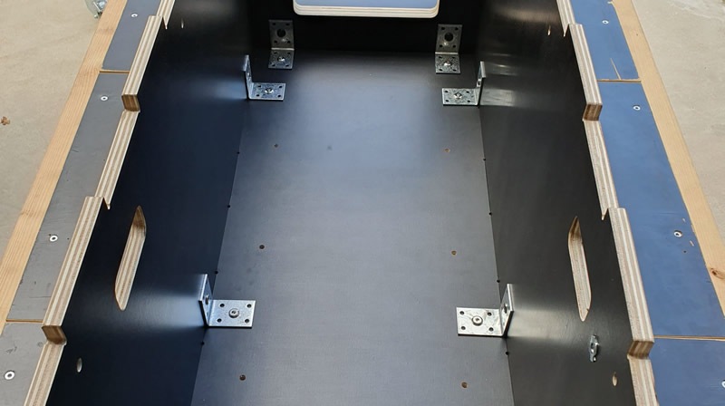 Camping box module - L-shaped brackets holding the plywood pieces together