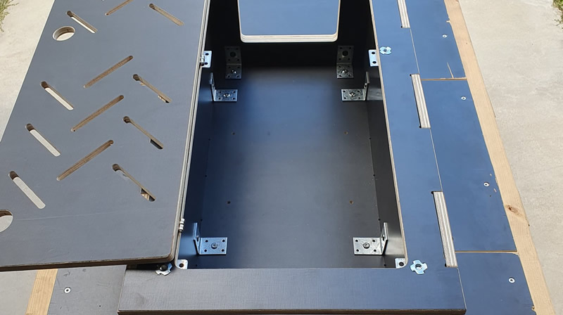L-shaped brackets viewed trough the top lid of a camping module